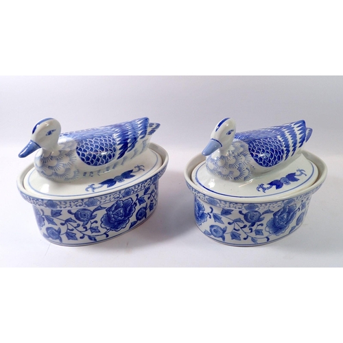 71 - A pair of blue and white tureens with duck form lids, 24cm long