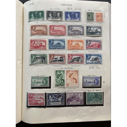 763 - Red Stanley Gibbons KGVI stamp album of mint definitives, commemoratives, officials and postage due,... 