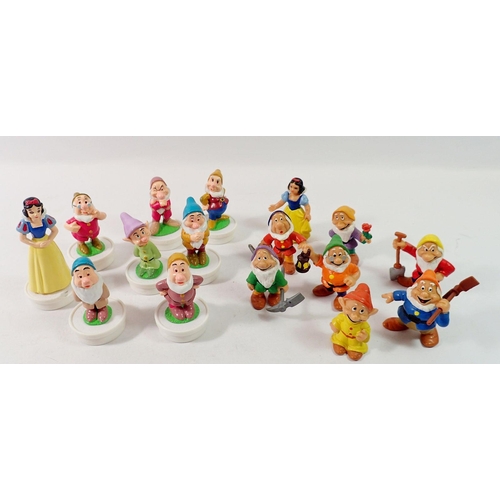 810 - Two sets of Snow White and the Seven Dwarves figures by Disney and Rowntree