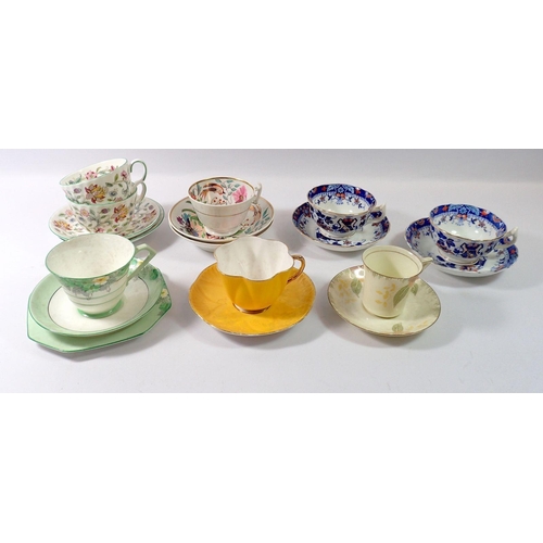 82 - A group of tea cups and saucers including Doulton, Shelley, Paragon and 19th century examples etc.