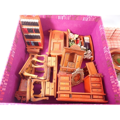 822 - A box of various dolls house furniture including china bathroom set, wire work conservatory table an... 