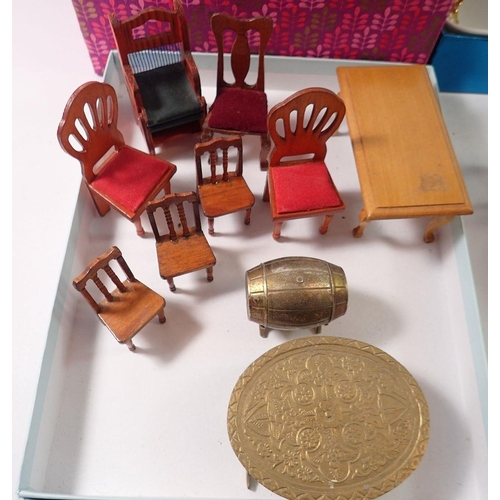 822 - A box of various dolls house furniture including china bathroom set, wire work conservatory table an... 