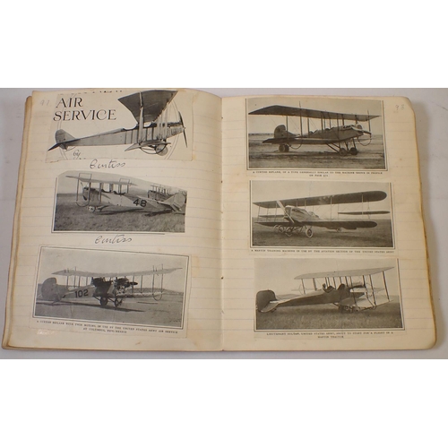 872 - A WWI scrap album of photographs, sketches and scraps including Fighter, Bombers and Sea Planes