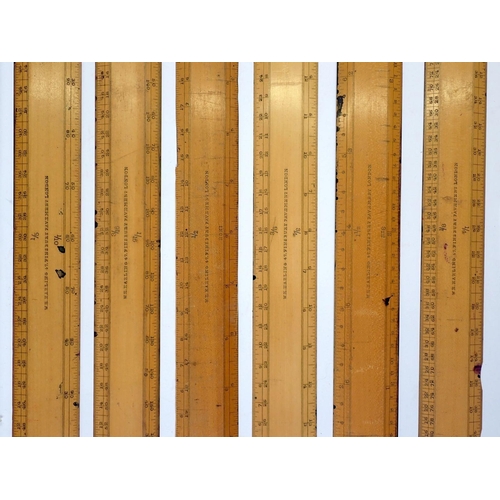 950 - A box of six wooden rulers by W Harling plus two Naval ebonies parallel rulers