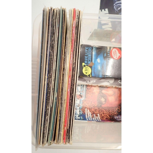 964 - A group of thirty vinyl record albums including 70's, 80's music - Mike Oldfield, Cliff Richard etc.... 