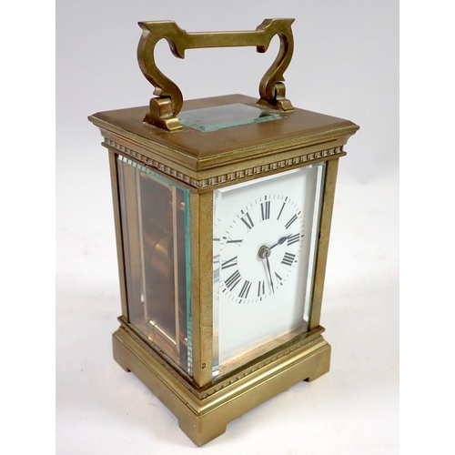 965 - A 19th century French brass carriage clock with travelling case and key, 12.5cm