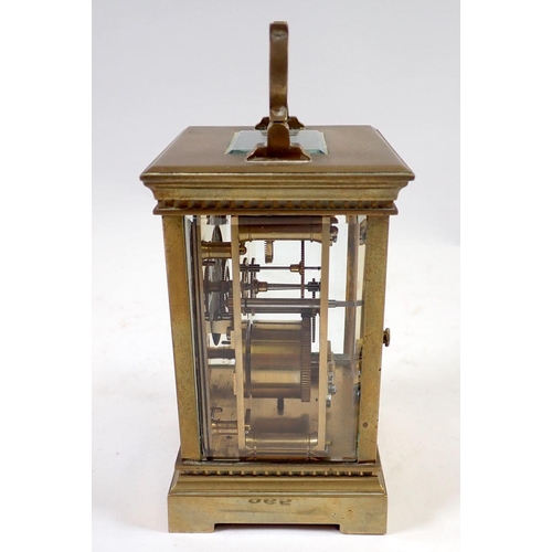 965 - A 19th century French brass carriage clock with travelling case and key, 12.5cm