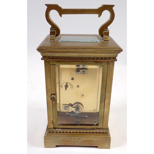 965 - A 19th century French brass carriage clock with travelling case and key, 12.5cm