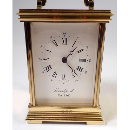 966 - A Woodford brass carriage clock, 14cm tall