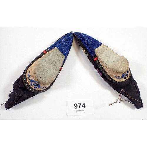 974 - A pair of early 20th century Chinese small embroidered shoes, 11cm