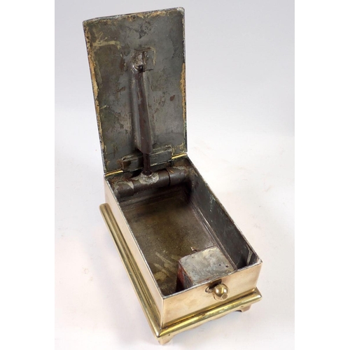 977 - A 19th century brass tobacco box with sliding knob mechanism, 16 x 10 x 7.5cm