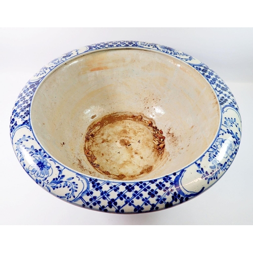 99 - A modern Chinese large blue and white bowl decorated figures in landscape, 51cm diameter