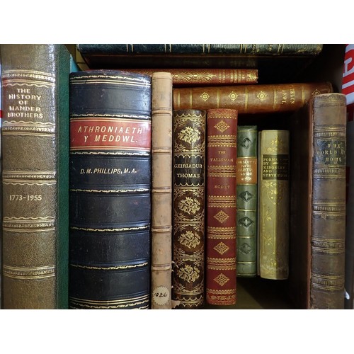 857 - A box of antique books with leather bindings