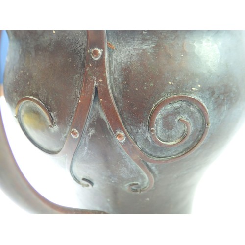 1136 - A Victorian beaten copper Arts & Crafts two handled planter, 18cm tall,