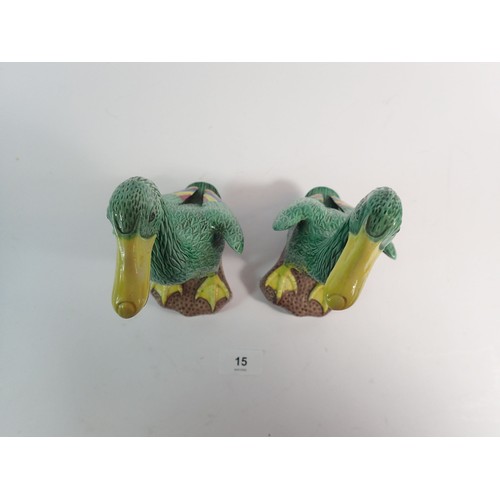 15 - A pair of Chinese glazed pottery ducks, 21cm high