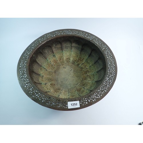 1252 - A large Indian copper brazier bowl with pierced rim and cast floral decoration, 40.5cm diameter