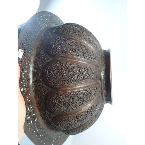 1252 - A large Indian copper brazier bowl with pierced rim and cast floral decoration, 40.5cm diameter