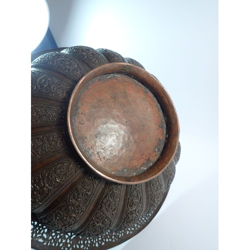 1252 - A large Indian copper brazier bowl with pierced rim and cast floral decoration, 40.5cm diameter