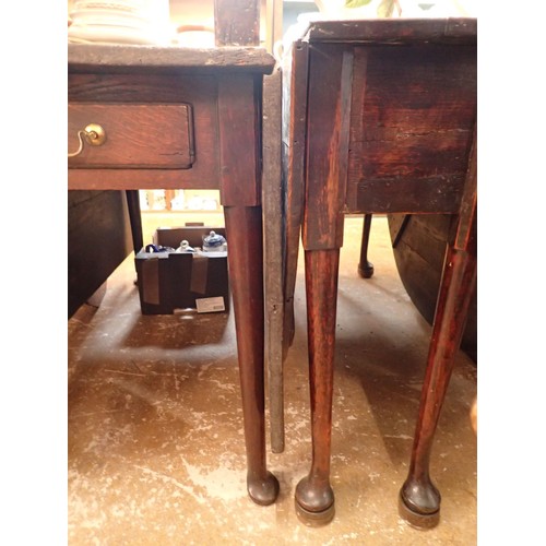 1330 - An 18th century oak dropleaf dining table with end drawer and pad feet, 52 x 112cm