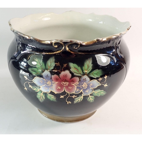 100 - A Victorian jardiniere painted flowers on a black ground, 22cm tall