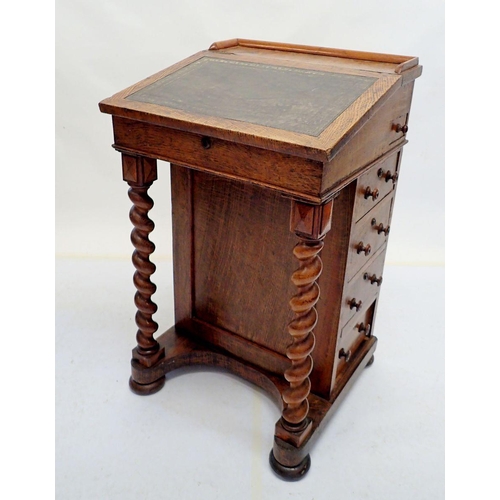 1003 - A Victorian oak Davenport desk with spiral turned supports, 54cm wide