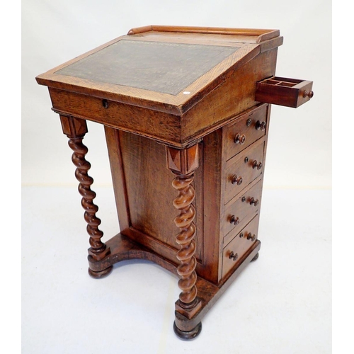 1003 - A Victorian oak Davenport desk with spiral turned supports, 54cm wide