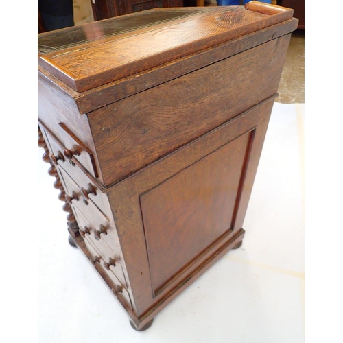 1003 - A Victorian oak Davenport desk with spiral turned supports, 54cm wide