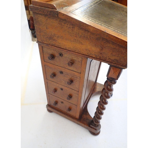 1003 - A Victorian oak Davenport desk with spiral turned supports, 54cm wide