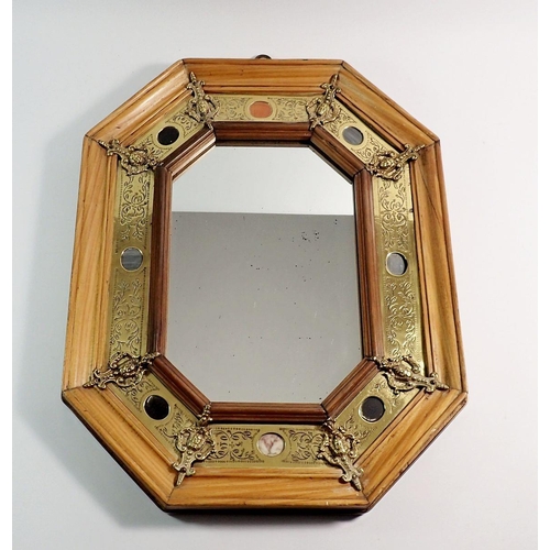 1008 - A continental wall mirror with stone and brass inset to satin walnut, 52 x 41cm