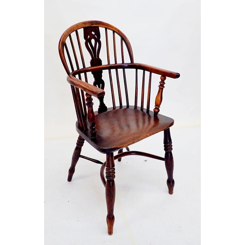 1016 - An 18th century yew and elm Windsor chair with crinoline stretcher