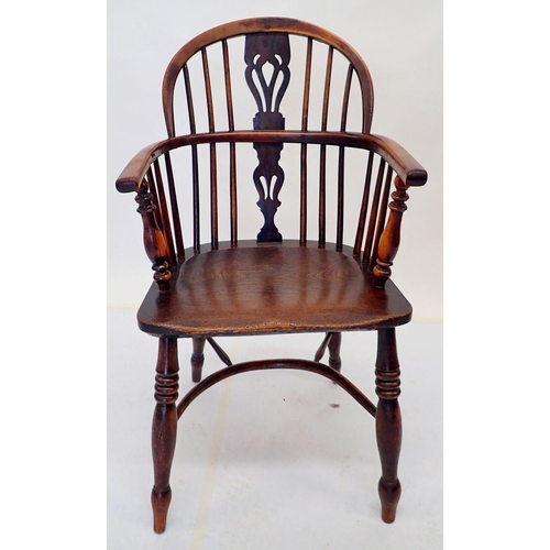 1016 - An 18th century yew and elm Windsor chair with crinoline stretcher