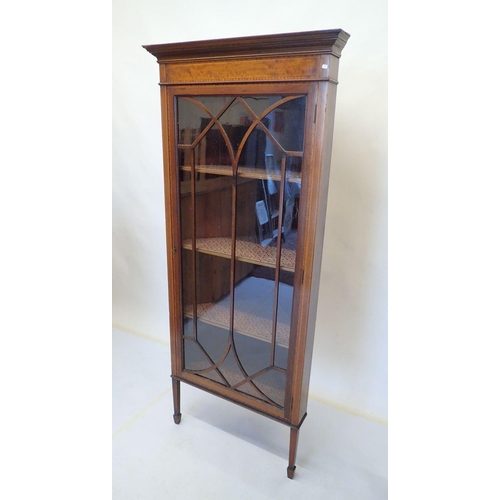 1035 - An Edwardian mahogany single door glazed corner display cabinet, 72 x 169cm tall