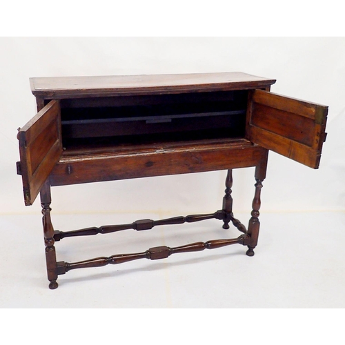 1038 - An 18th century small cabinet on stand dated 1764 raised on turned stratchers and with beaded IR mon... 