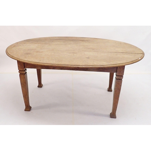 1053 - An oak Edwardian oval dining table on square tapered supports, 150 x 105cm