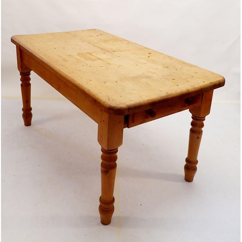 1055 - A pine farmhouse style dining table with frieze drawer, 151 x 80cm