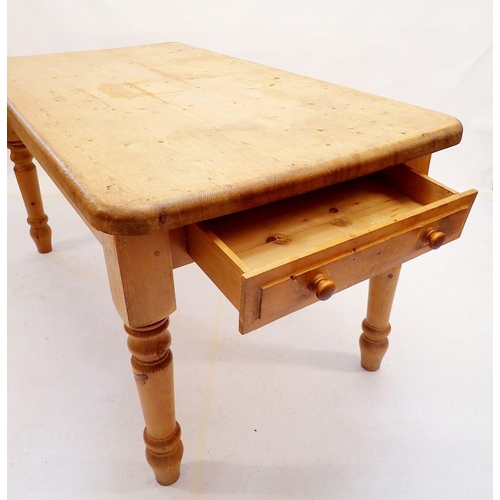 1055 - A pine farmhouse style dining table with frieze drawer, 151 x 80cm