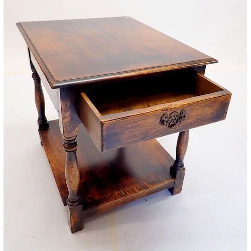 1059 - An oak two tier occasional table on turned supports with drawer, 60 x 50cm