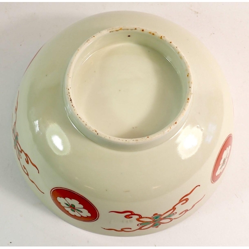 116 - A Chinese fruit bowl painted trees and stylised symbols, 22cm diameter