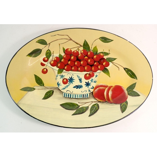 122 - A porcelain oval serving dish painted bowl of cherries, 40cm wide