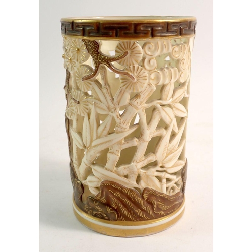 129 - A Royal Worcester Japanese style reticulated vase in ivory and gilt with bamboo and tree decoration,... 