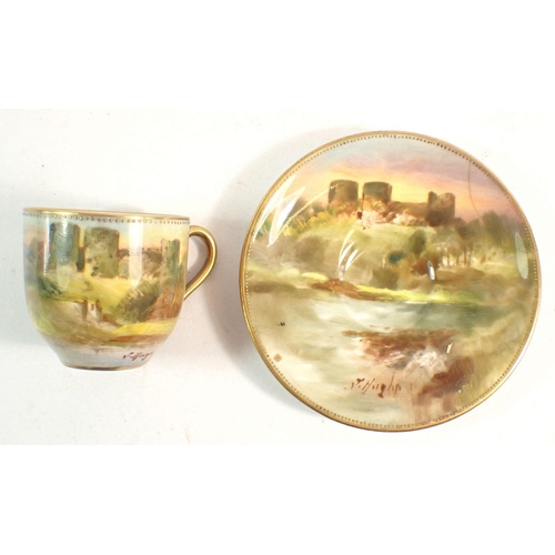 143 - A Royal Doulton small cabinet cup and saucer painted Rhuddlan Castle, signed John Hughes - saucer a/... 