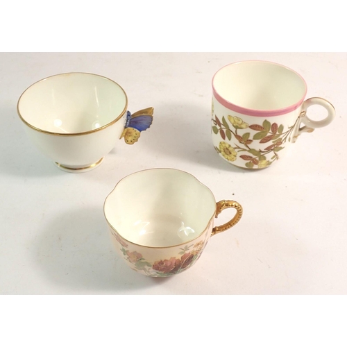 144 - A Worcester teacup with butterfly handle and two floral painted Worcester teacups - all without sauc... 