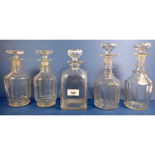 165 - A pair of early 19th century cut glass decanters, 20cm tall plus three others