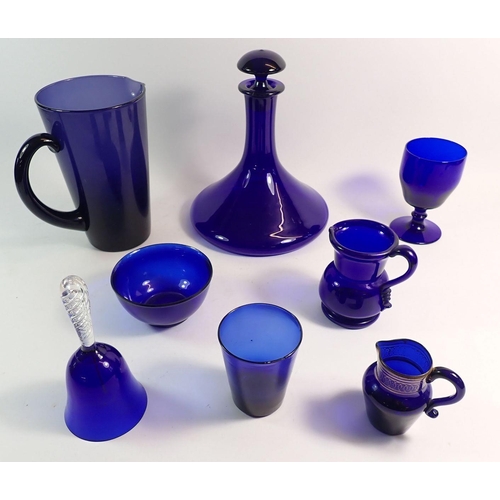 169 - A collection of Bristol blue glass comprising eight pieces: large jug, ships decanter, small sided j... 