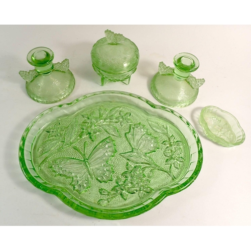 176 - An early 20th century green glass dressing table set decorated butterflies