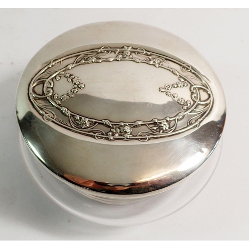 193 - A glass powder pot with silver lid, London 1909 by William Comyns, lid 68g plus a silver cup holder ... 