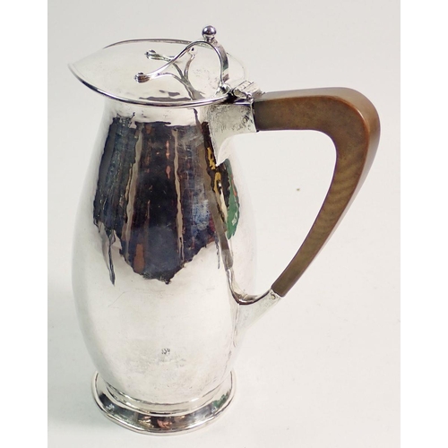 228 - An Arts & Crafts silver coffee jug, Birmingham 1919 by A E Jones, total weight 448g 20cm tall