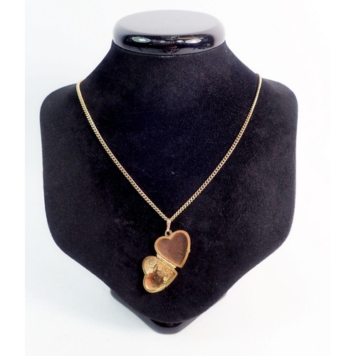 299 - A 9 carat gold heart locket on chain, 8.3g, 45cm chain