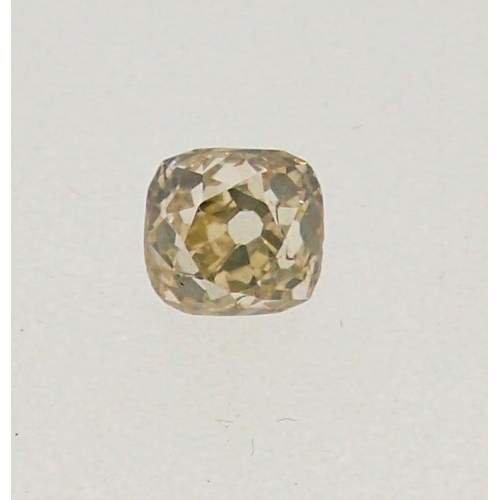 311 - An unmounted cushion cut yellow diamond, approx diamond weight 0.77ct