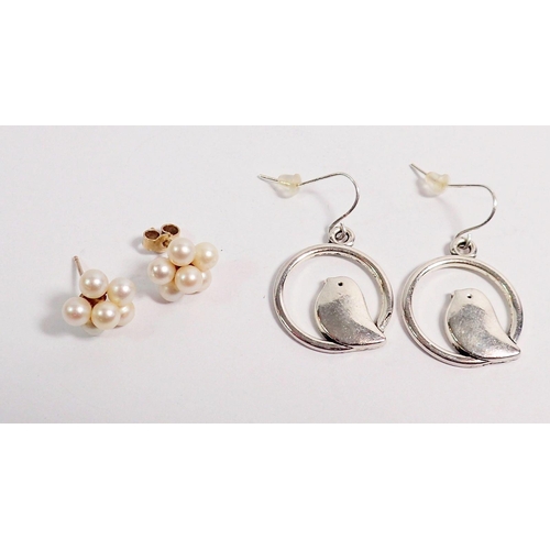 333 - A pair of yellow metal and pearl cluster earrings and a pair of white metal bird earrings